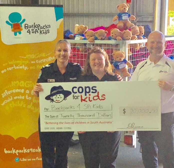 Martin presenting the cheque to Rachel from Backpacks 4 SA Kids