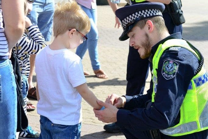 Police officer with child